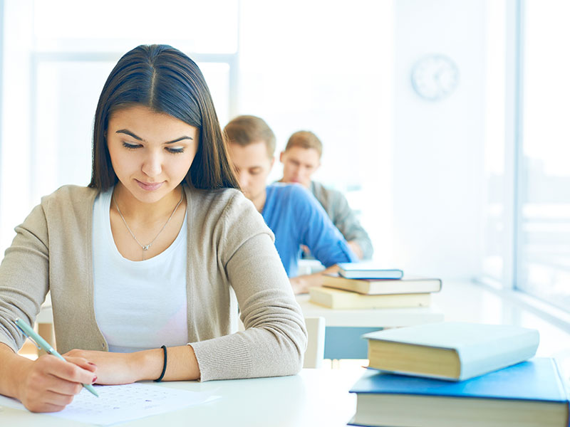 Professionals taking competitive skills assessments