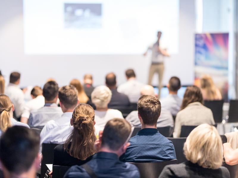 Professionals networking at a Rekruters conference